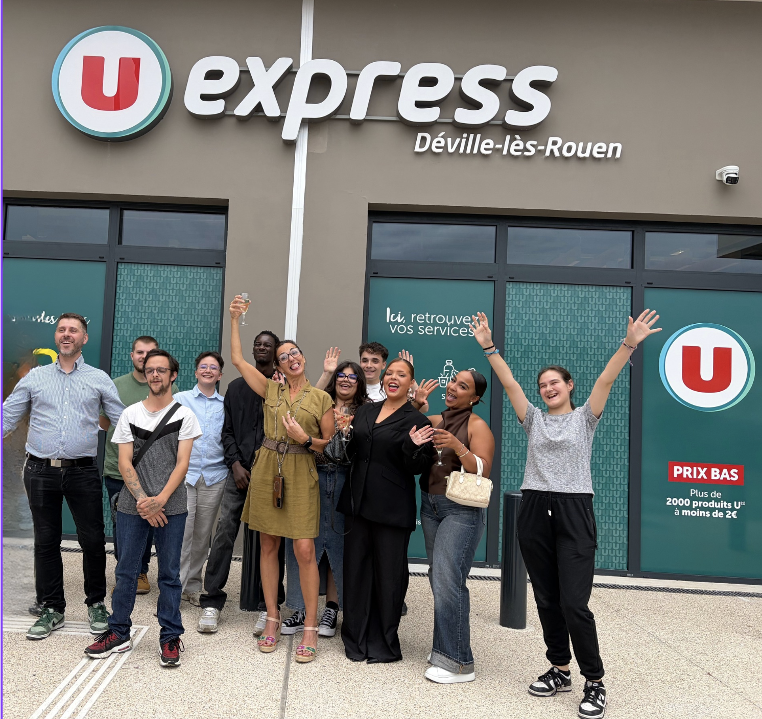 L'équipe du U Express de Déville-lès-Rouen et son associé le jour de l'ouverture